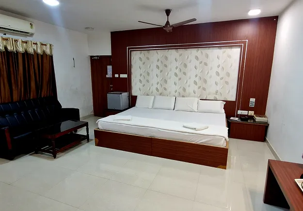 Luxury Suite Room with modern interiors at Sathya Garden Resort, exclusive hotel suite in Mettupalayam Coimbatore